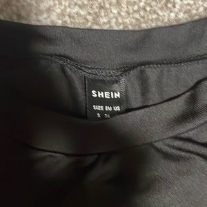 Women’s short sleeve body suit